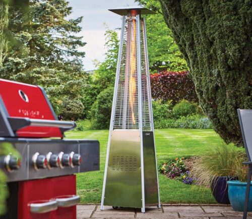 stainless steel tahiti patio heater with red bbq in foreground