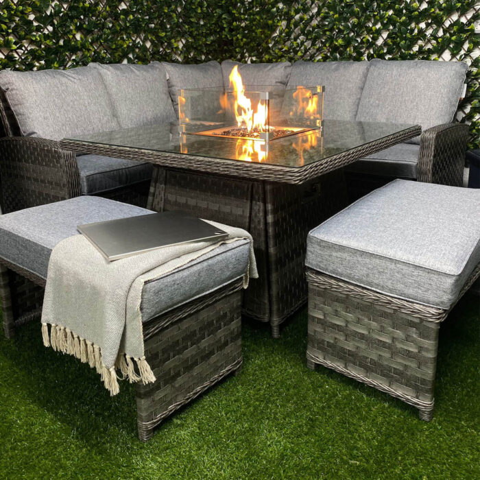 crawfordsburn fire pit corner dining set in dark grey with corner sofa and 2 benches with gas fire pit in centre of table