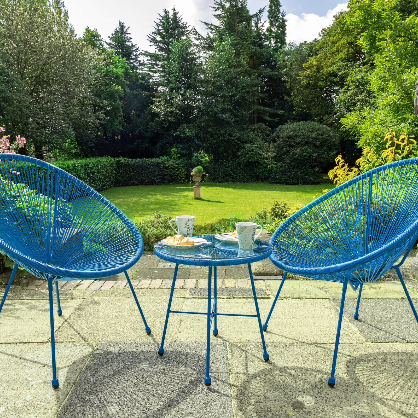 blue egg chair bistro set with 2 seats and table on garden or patio display