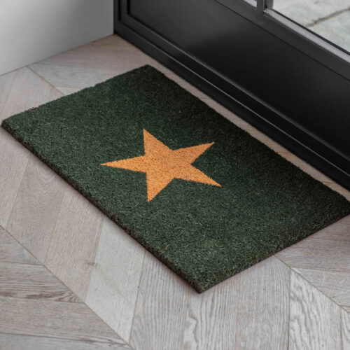 forest green doormat with golden star in centre, for front door or porch from garden trading