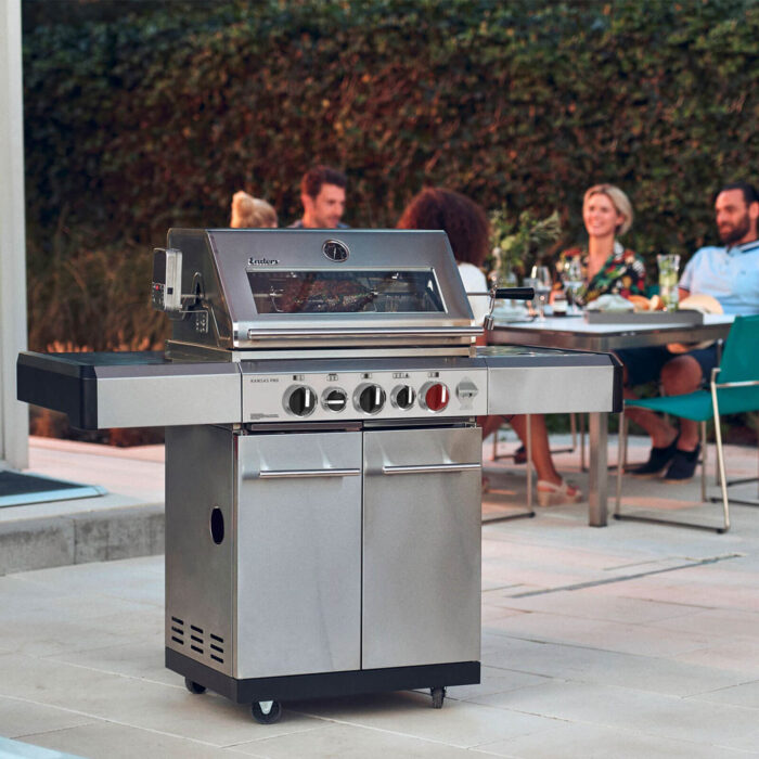 enders kansas pro 3 sik turbo gas bbq with large storage cabinets, window hood in stainless steel in a patio or garden for summer