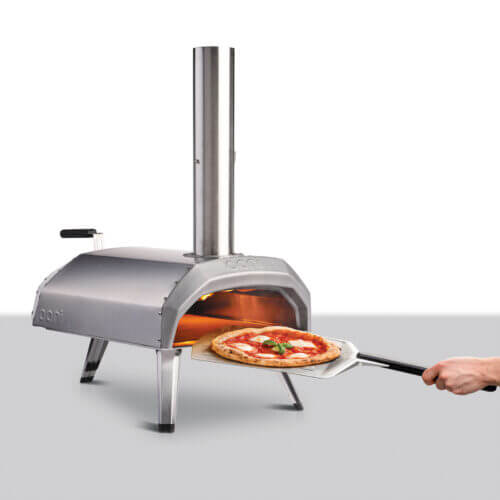 ooni karu 12 multi fuel pizza oven that can be fueled by charcoal wood or gas for homemade pizzas